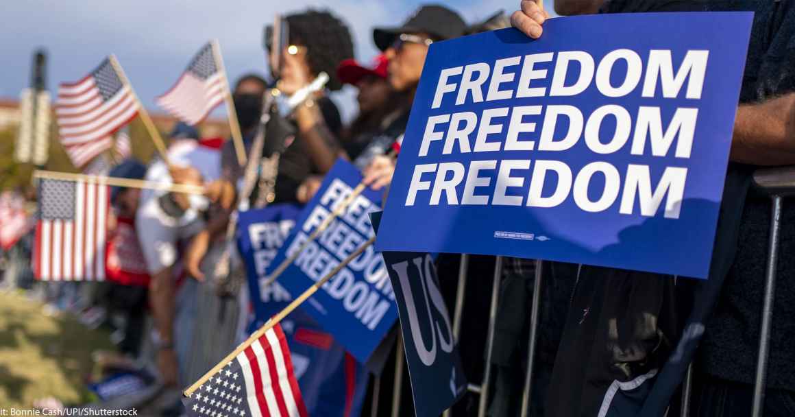 Freedom signs and American flags