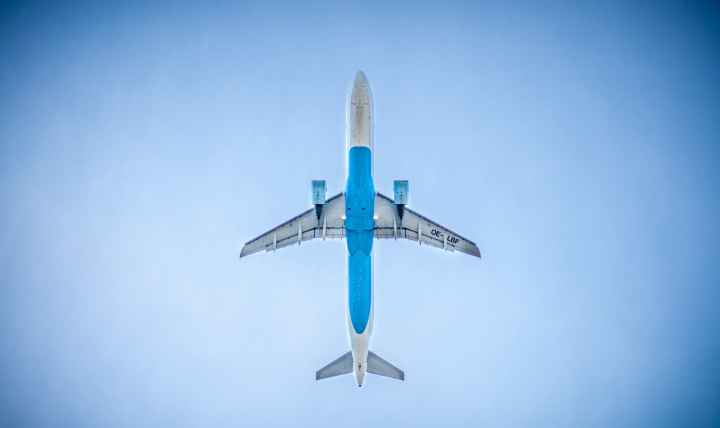 A jet in flight directly overhead