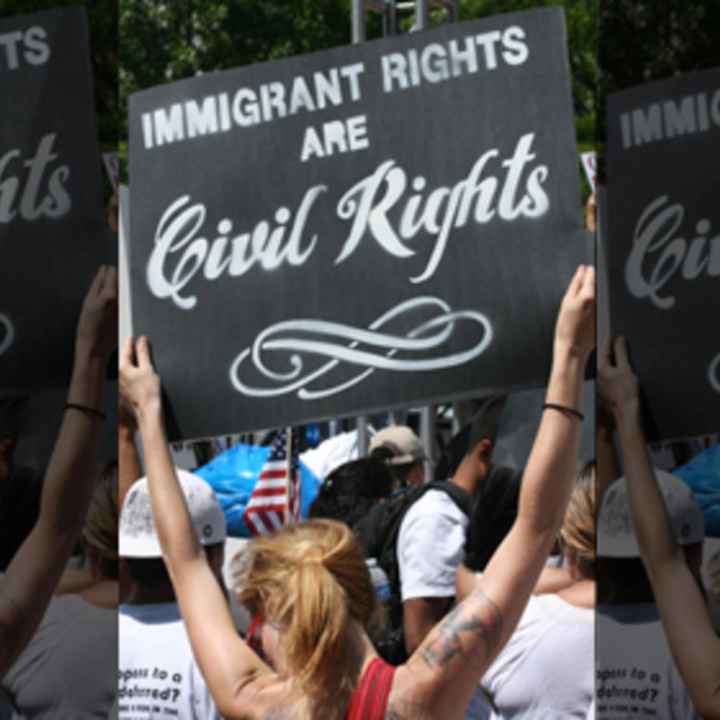immigrant rights sign at rally