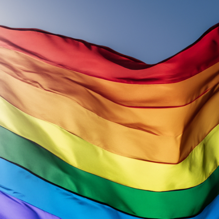 a rippling rainbow flag